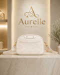 Aurelle Monogram Pochette in Ivory front view