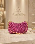 Lune Hobo on marble pedestal in Aurelle boutique